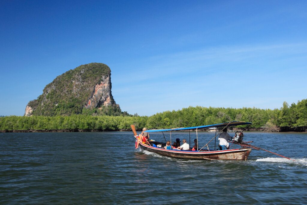 pumpboat-on-Khao-Lak-Phang-Nga-Thailand-with-surrounding-mangrove-trees