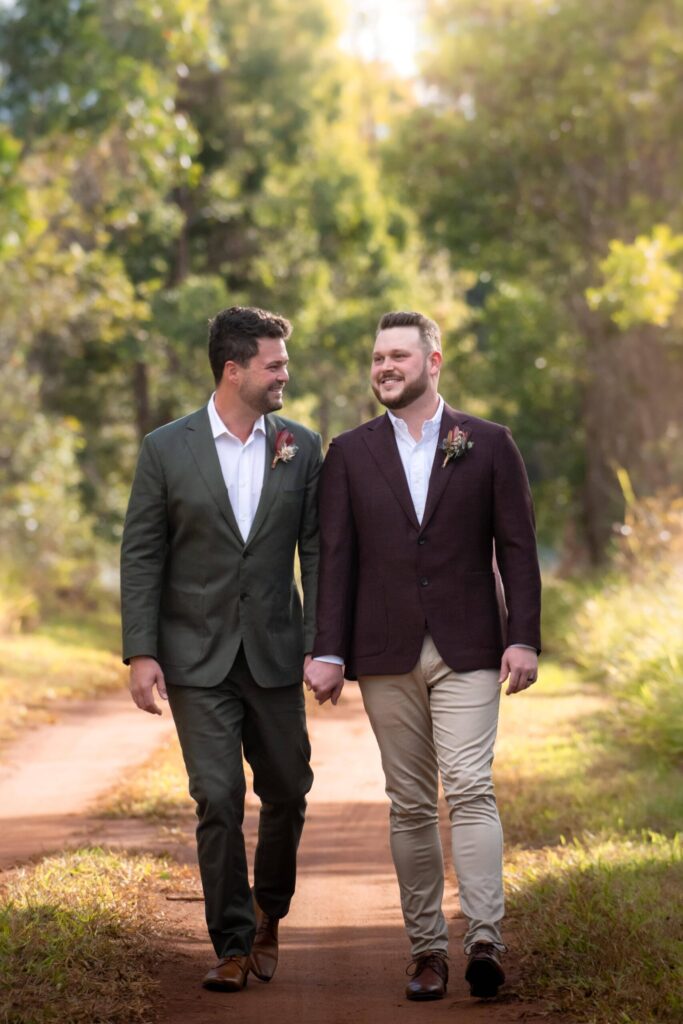 Real-wedding-Luke-and-Mitch-at-The-Crocodile-Lodge-Australia-Zoo-Queensland-newlywedded-couple-portrait-walking