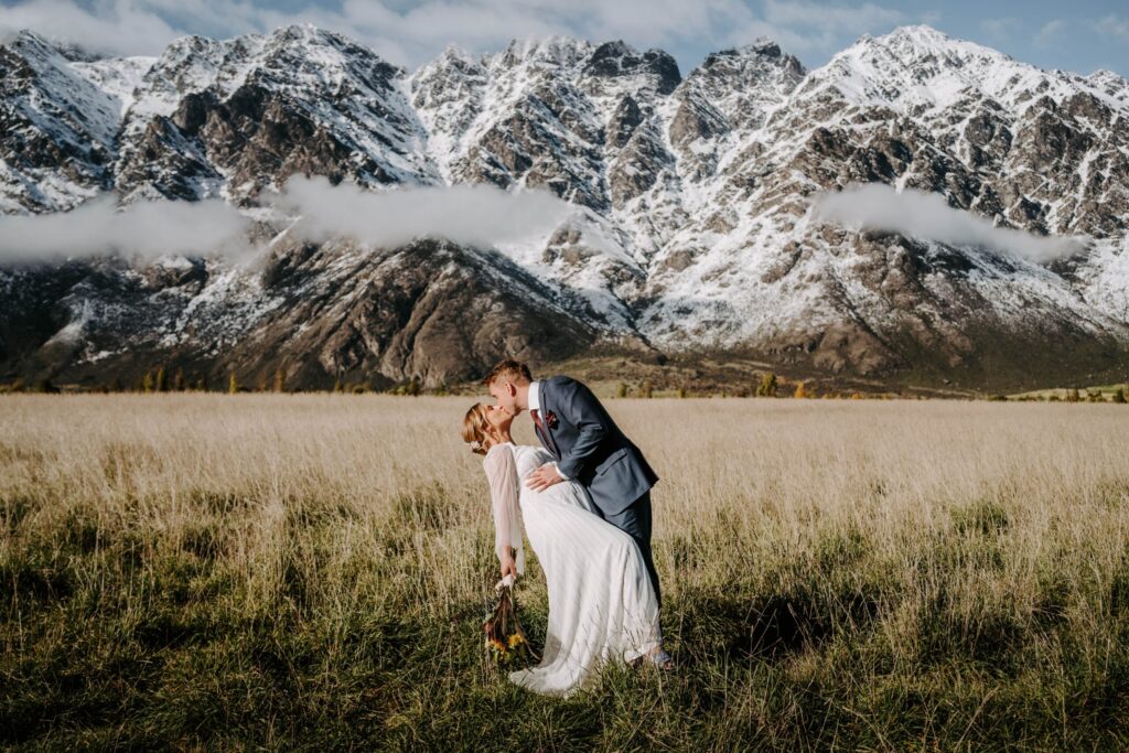Real-wedding-Katie-and-Ben-New-Zealand-full-body-romantic-kiss-portrait