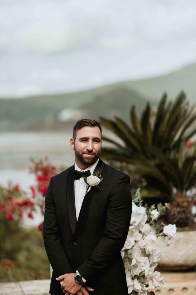 Real-wedding-Teagan-and-Luke-Villa-Botanica-Whitsundays-Australia-by-Rolling-Portraits-wedding-ceremony-groom-waiting-for-the-bride