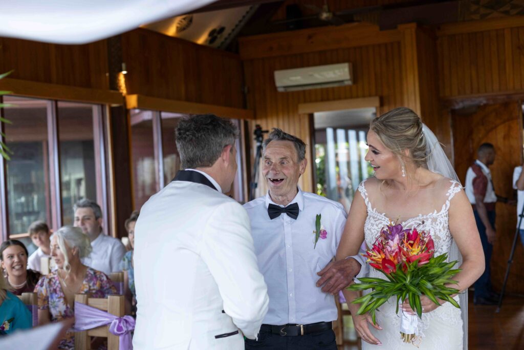 Kylee & Jason at Outrigger Fiji Beach Resort - images by Ocean Studio Fiji - bride and groom during the wedding ceremony