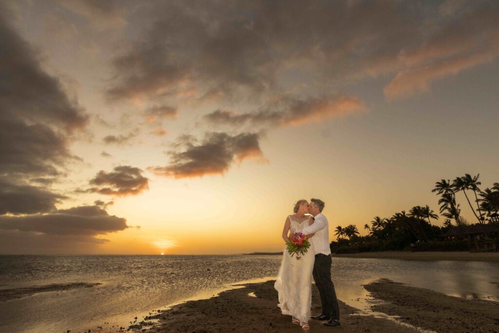 Kylee & Jason at Outrigger Fiji Beach Resort - images by Ocean Studio Fiji - bride and groom sunset portrait at the beach