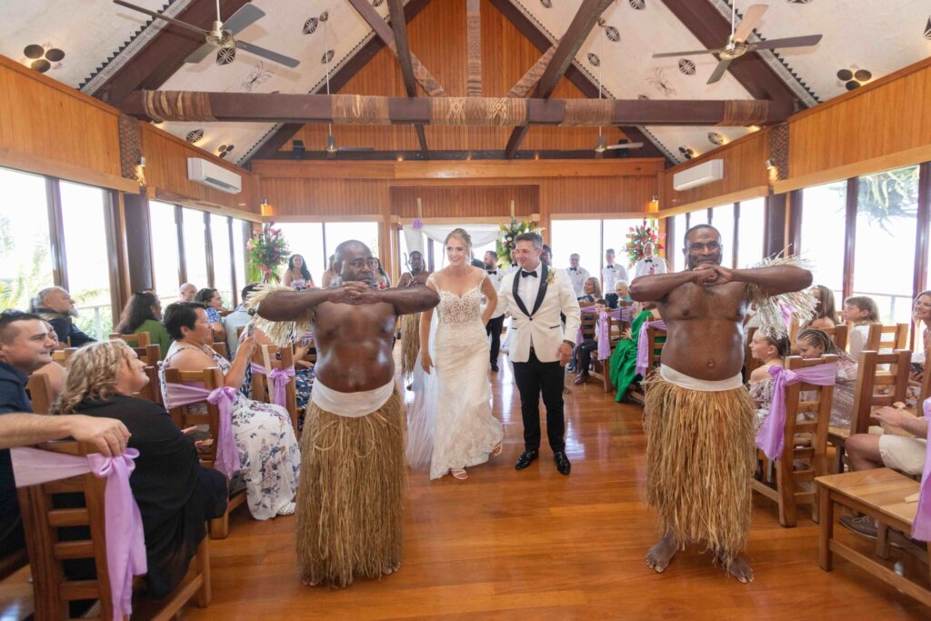 Kylee & Jason at Outrigger Fiji Beach Resort - images by Ocean Studio Fiji - bride and groom walking down the aisle