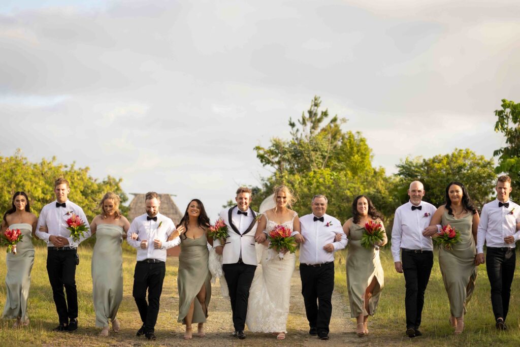 Kylee & Jason at Outrigger Fiji Beach Resort - images by Ocean Studio Fiji - bride and groom with groomsmen and bridesmaids