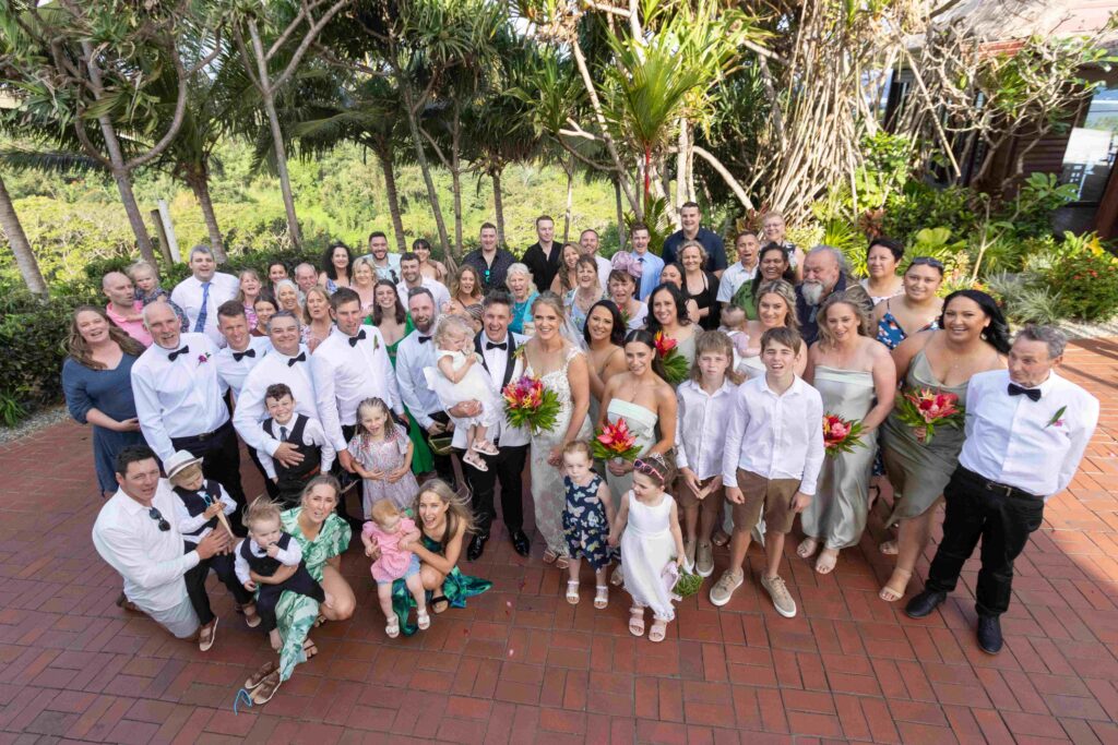 Kylee & Jason at Outrigger Fiji Beach Resort - images by Ocean Studio Fiji - bride and groom with guests