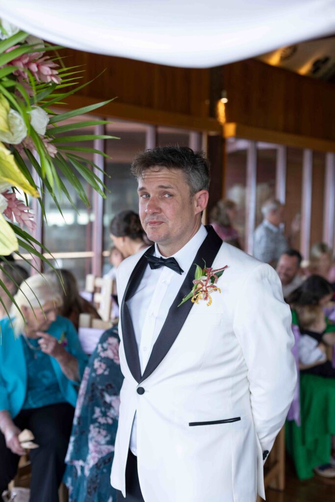 Kylee & Jason at Outrigger Fiji Beach Resort - images by Ocean Studio Fiji - groom waiting for the bride during wedding ceremony