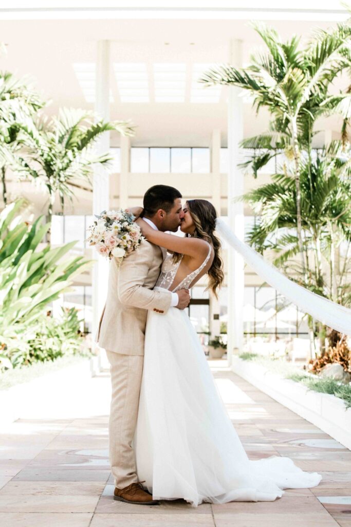 Real Wedding - Arthur and Gabby - Intercontinental Hayman Island by Timeless images by Vanessa - bride and groom kiss