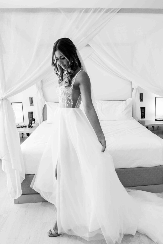 Real Wedding - Arthur and Gabby - Intercontinental Hayman Island by Timeless images by Vanessa - bride trying out her wedding dress