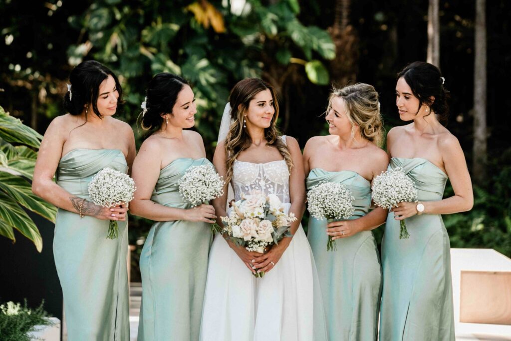 Real Wedding - Arthur and Gabby - Intercontinental Hayman Island by Timeless images by Vanessa - bride with bridesmaids outdoors